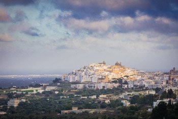 The late afternoon sun strikes the hilltop town of Ostuni in the southern Italian province of Brindisi, in the region of Puglia. The area around Ostuni is very historic and has been inhabited since the Stone Age. Prints are available, for details please click the Purchase link above.