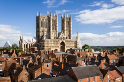 Lincoln Cathedral is a historic cathedral located in Lincoln in England and seat of the Bishop of Lincoln in the Church of England. Building commenced in 1088 and continued in several phases throughout the medieval period. It was reputedly the tallest building in the world for 249 years (1300–1549).